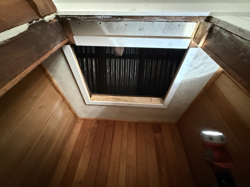 Ceiling access opening before the hatch cover is fitted