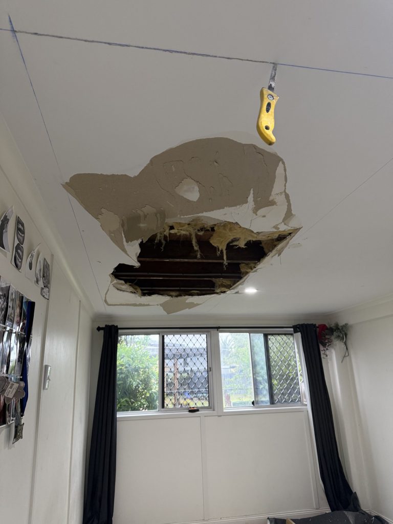 Damaged residential ceiling before repairs