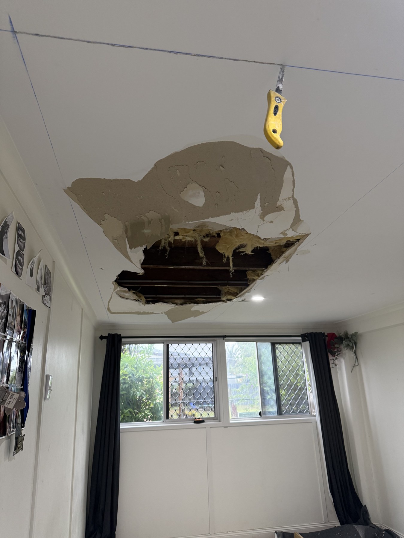 Damaged residential ceiling before repairs