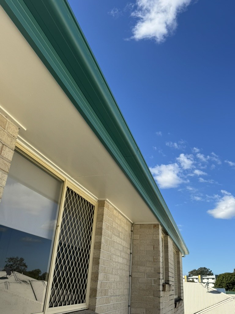 Painted fascia and eaves along a property roofline